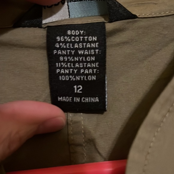 Moda International, sleeveless olive zip up body suit with lace bottoms. - Picture 5 of 6